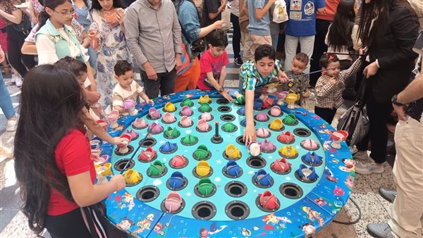 بالصور.. ألعاب إلكترونية وأجواء احتفالية بعيد القيامة داخل كنيسة الأنبا بيشوي في بورسعيد